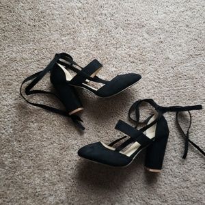 Black suede heels.